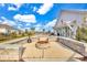 An outdoor fire pit with stone surround, creating a cozy spot for residents to gather and enjoy the outdoors at 2593 Pegasus Place, Myrtle Beach, SC 29577