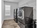 Convenient laundry room with modern washer and dryer units, a practical and functional space at 2593 Pegasus Place, Myrtle Beach, SC 29577