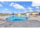 Community swimming pool surrounded by lounge chairs offers a refreshing place to relax and enjoy outdoor recreation at 2593 Pegasus Place, Myrtle Beach, SC 29577