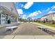 Outdoor recreation area with cornhole game and grassy lawn, a perfect space for community fun and leisure at 2593 Pegasus Place, Myrtle Beach, SC 29577