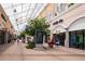 Outdoor shopping center featuring popular stores, overhead lighting, and people walking around at 280 Warner Crossing Way, Loris, SC 29569