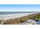 Stunning aerial view of the beach, pool area, and outdoor dining at this spectacular property at 2801 S Ocean Blvd. # 733, North Myrtle Beach, SC 29582