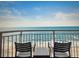 Relax on this beachfront balcony with chairs and a table, enjoying breathtaking ocean views at 2801 S Ocean Blvd. # 733, North Myrtle Beach, SC 29582