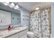 Bathroom featuring modern sink with updated fixtures and nautical-themed shower curtain at 2801 S Ocean Blvd. # 733, North Myrtle Beach, SC 29582