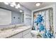 Bathroom featuring modern sink with updated fixtures and a charming, themed shower curtain at 2801 S Ocean Blvd. # 733, North Myrtle Beach, SC 29582