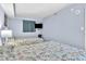 Bedroom featuring two twin beds, blue walls and a flat screen television at 2801 S Ocean Blvd. # 733, North Myrtle Beach, SC 29582
