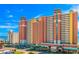 Beautiful exterior view of a condo complex, with a parking lot and vibrant blue skies at 2801 S Ocean Blvd. # 733, North Myrtle Beach, SC 29582