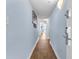Long hallway with blue walls and doors leading to the rooms, promoting a quiet private space at 2801 S Ocean Blvd. # 733, North Myrtle Beach, SC 29582