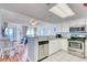 Well-equipped kitchen with a breakfast bar offers a seamless connection to the inviting living space at 2801 S Ocean Blvd. # 733, North Myrtle Beach, SC 29582