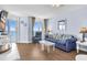 Relaxing living room with a comfy blue couch and a scenic ocean view at 2801 S Ocean Blvd. # 733, North Myrtle Beach, SC 29582