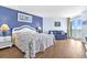 Comfortable bedroom with balcony access and ocean views at 2801 S Ocean Blvd. # 733, North Myrtle Beach, SC 29582