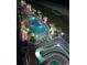Aerial view of a large outdoor pool and lazy river area at night at 2801 S Ocean Blvd. # 733, North Myrtle Beach, SC 29582
