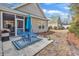 Backyard patio with blue outdoor seating and a grill at 300 Nuthatch Ln. # A, Murrells Inlet, SC 29576