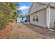 Cozy backyard patio featuring a dining set and outdoor space for relaxing and entertaining at 300 Nuthatch Ln. # A, Murrells Inlet, SC 29576