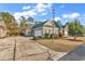 Charming one-story home with a well-maintained lawn, attached garage and neutral beige exterior at 300 Nuthatch Ln. # A, Murrells Inlet, SC 29576