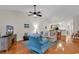 Inviting living room featuring hardwood floors and neutral walls and views into the dining and kitchen at 300 Nuthatch Ln. # A, Murrells Inlet, SC 29576