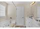 Bright bathroom with double vanity, and soaking tub provides a luxurious experience at 3124 Ivy Lea Dr., Conway, SC 29526