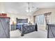 Vaulted ceilings and window views compliment this spacious bedroom with rustic wood furniture at 3124 Ivy Lea Dr., Conway, SC 29526