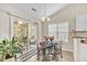 Cozy breakfast nook with sliding glass doors leading to a screened-in patio at 3124 Ivy Lea Dr., Conway, SC 29526