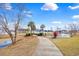 Picturesque community pond with a walking path, beautiful landscaping, and a serene water feature at 3124 Ivy Lea Dr., Conway, SC 29526