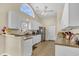 Well-lit kitchen featuring stainless steel appliances, white cabinetry, and a practical layout for cooking at 3124 Ivy Lea Dr., Conway, SC 29526