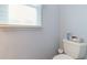 Powder room toilet with toilet paper roll and a white toilet seat at 317 14Th Ave. N, Surfside Beach, SC 29575