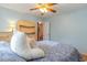 Bedroom featuring a plush headrest pillow on a bed with light blue patterned bedding at 317 14Th Ave. N, Surfside Beach, SC 29575