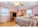 Bedroom featuring a television and dresser along with hardwood floors at 317 14Th Ave. N, Surfside Beach, SC 29575