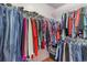 Walk-in closet with shelving and hanging clothes at 317 14Th Ave. N, Surfside Beach, SC 29575