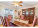 Formal dining room with a wooden table, hutch and natural light from the windows at 317 14Th Ave. N, Surfside Beach, SC 29575