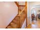 Classic wooden staircase with a sturdy banister, leading to the upper level of the home at 317 14Th Ave. N, Surfside Beach, SC 29575