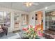 Inviting sunroom with a lattice ceiling, tiled floor, and abundant natural light entering from large windows at 317 14Th Ave. N, Surfside Beach, SC 29575