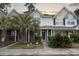 Charming townhome with brick facade, manicured landscaping, and a welcoming entryway at 3524 Crepe Myrtle Ct. # 3524, Myrtle Beach, SC 29577