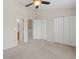 This carpeted main bedroom provides two walk-in closets and an ensuite bathroom at 3524 Crepe Myrtle Ct. # 3524, Myrtle Beach, SC 29577