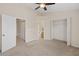 Carpeted main bedroom boasts an ensuite bathroom and closet at 3524 Crepe Myrtle Ct. # 3524, Myrtle Beach, SC 29577