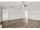 Bright living room with vaulted ceiling, ceiling fan, and hardwood floors at 375 West Dogwood Rd., Loris, SC 29569