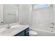 Bathroom featuring a shower-tub combo with a modern vanity with sleek fixtures and a large mirror at 379 West Dogwood Rd., Loris, SC 29569