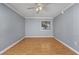 Bedroom featuring a ceiling fan, neutral walls, and a window with blinds at 407 76Th Ave. N # C, Myrtle Beach, SC 29572