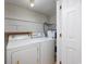 This laundry room features a washer, dryer, and a water heater at 407 76Th Ave. N # C, Myrtle Beach, SC 29572