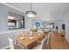 Living room and dining room featuring an open view into the kitchen at 407 76Th Ave. N # C, Myrtle Beach, SC 29572