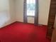 This bedroom features carpet and a window at 51 Cleburn St., Georgetown, SC 29440