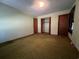 This bedroom offers carpet and closet at 51 Cleburn St., Georgetown, SC 29440