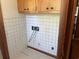 Functional laundry room with tiled walls and space for appliances at 51 Cleburn St., Georgetown, SC 29440