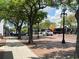 Street view showcasing the architecture of businesses under the shade of mature trees at 51 Cleburn St., Georgetown, SC 29440