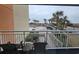 Balcony with ocean views, palm trees and outdoor furniture overlooking the pool at 5200 N Ocean Blvd. # 151, Myrtle Beach, SC 29577