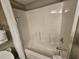 Clean bathtub and shower with white tiling and curtain at 5200 N Ocean Blvd. # 151, Myrtle Beach, SC 29577