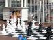 Outdoor chess set with oversized pieces near a snow cone stand at 5200 N Ocean Blvd. # 151, Myrtle Beach, SC 29577