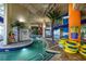 Relaxing indoor lazy river offers a serene water experience with lush foliage and colorful murals, complete with inner tubes at 5200 N Ocean Blvd. # 155, Myrtle Beach, SC 29577