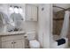 Well-lit bathroom featuring granite counters, a vanity with storage, and a shower/tub combo with neutral color palette at 5511 North Ocean Blvd. # 1105, Myrtle Beach, SC 29577