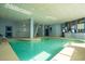 Bright indoor pool area with large windows and a lifeguard at 5511 North Ocean Blvd. # 1105, Myrtle Beach, SC 29577